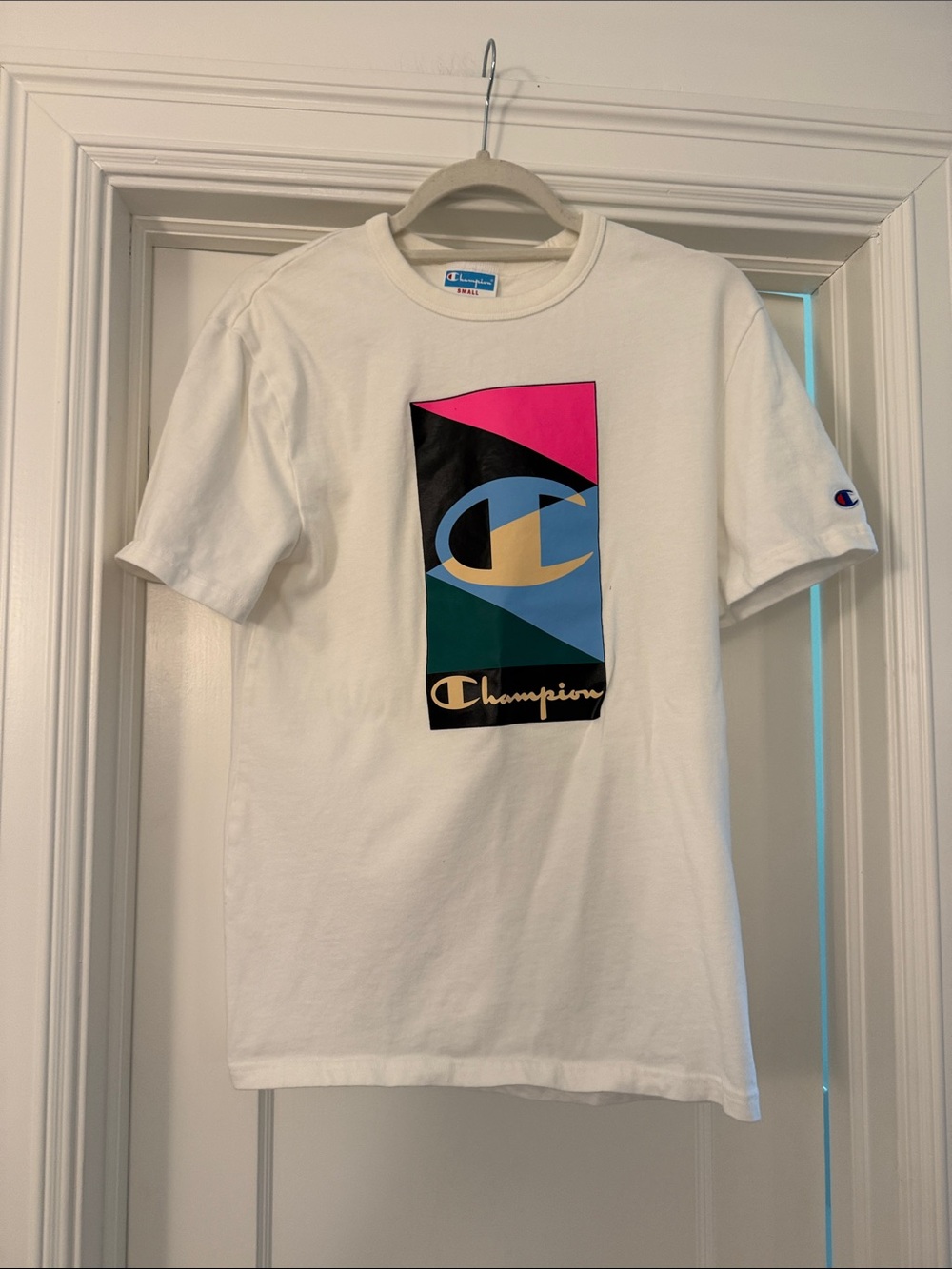 Champion White Tee with Pink, Black, Blue & Teal Graphic